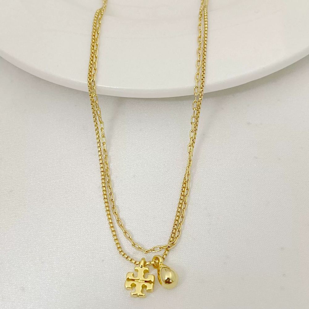 Tory Burch Gold Layered Bead Pendant Necklace